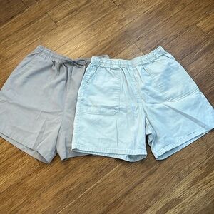 Two pair of great basic tan shorts.